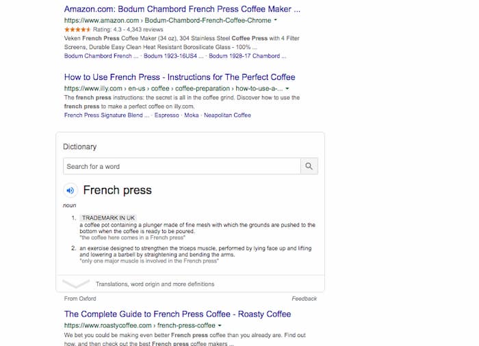 This SERP example for the keyword french press continues with a definition and finally the first blue organic link